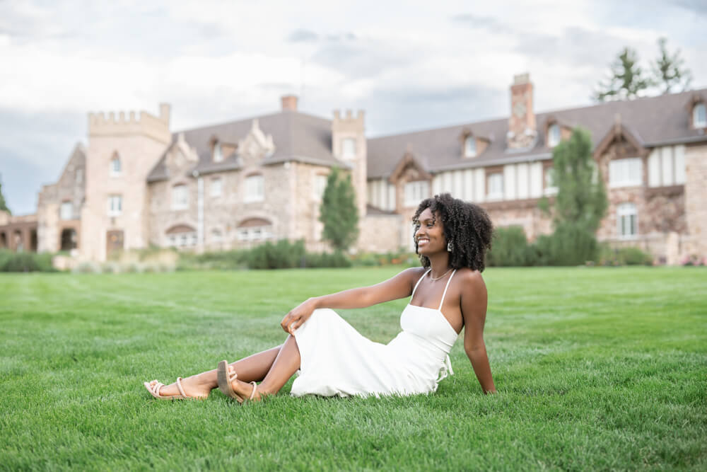 high school senior in front of a castle