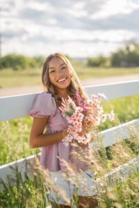 girl holding some flowers