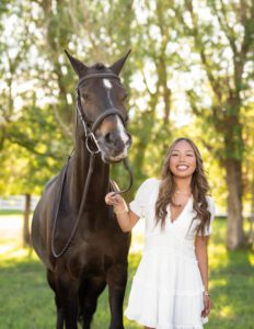 girl and her horse smiling