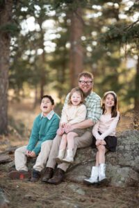 dad and kids playing games