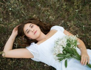 girl enjoying the flowers