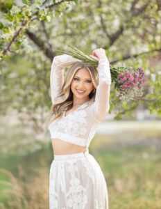 girl holding her flowers in parker