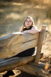 high school senior sitting on a bench