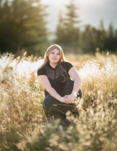 girl sitting on grass