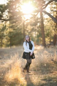 girl wearing glasses in her senior session
